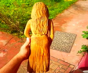 Hermosa estatua mujer indígena tallada a mano