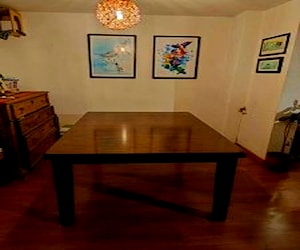 Mesa de comedor de madera Ashley - expansible