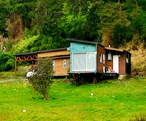 Parcela con casa en excelente ubicación