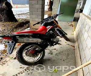 Moto todo terreno por fin de faena ,motorrat