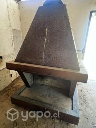 <p>Grandiosa chimenea nueva de cobre y madera</p>