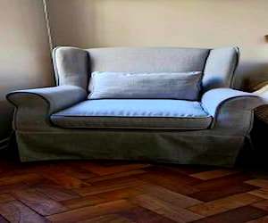 <p>Poltrona Lino gris semi nueva</p>